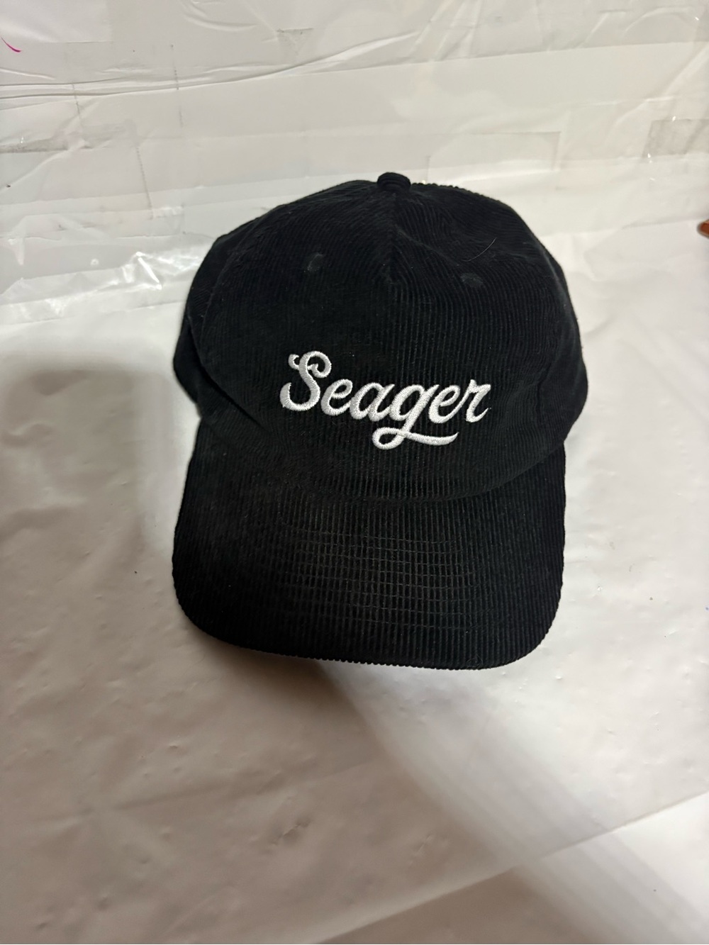 Seager Black Corduroy Cap with White Script Logo